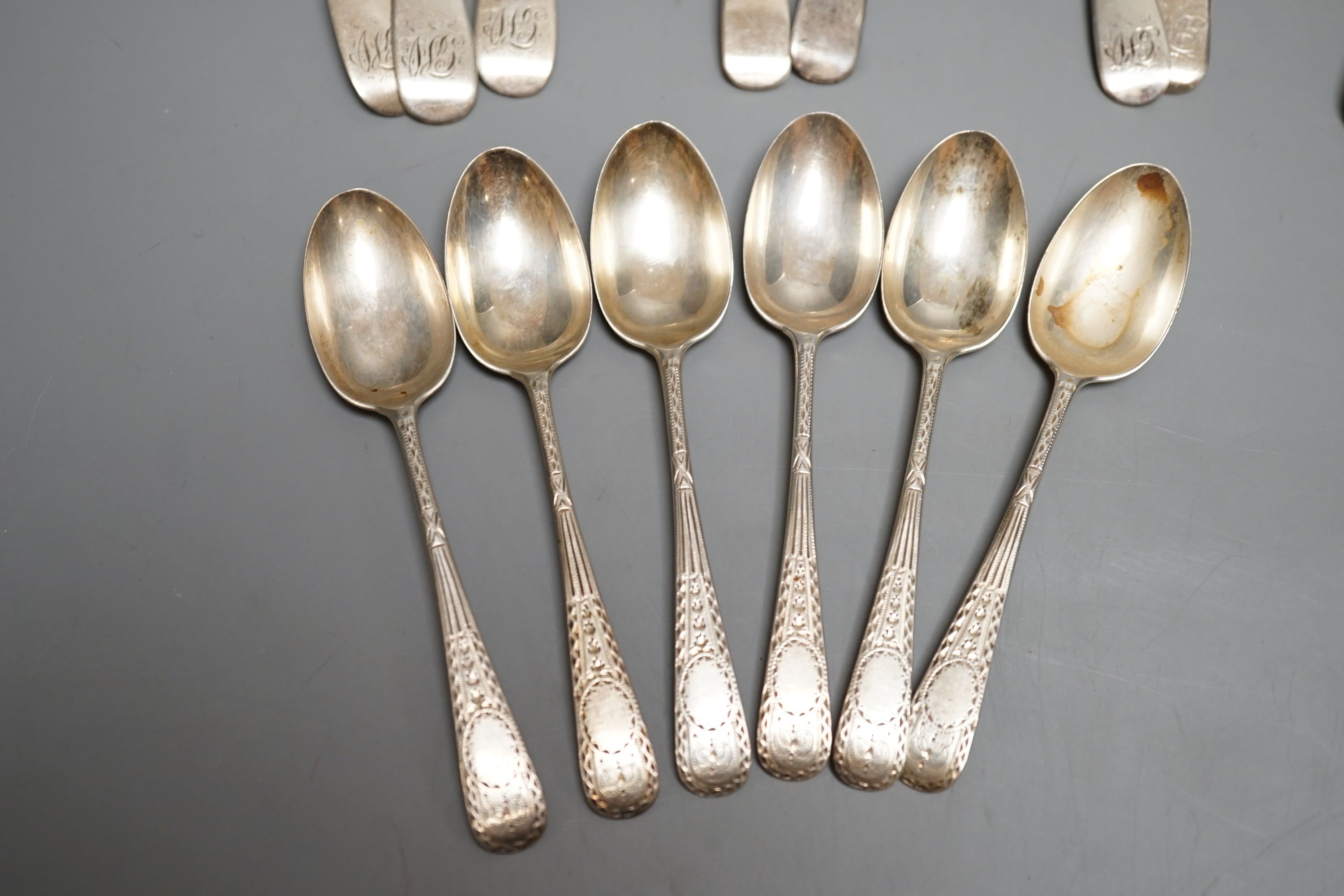 A quantity of silver teaspoons, sifter spoons and condiment spoons, including a set of six coffee spoons, London, 1899